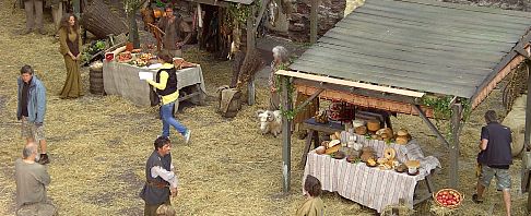 A market at Berkeley Castle with traders dressed in period costume. 